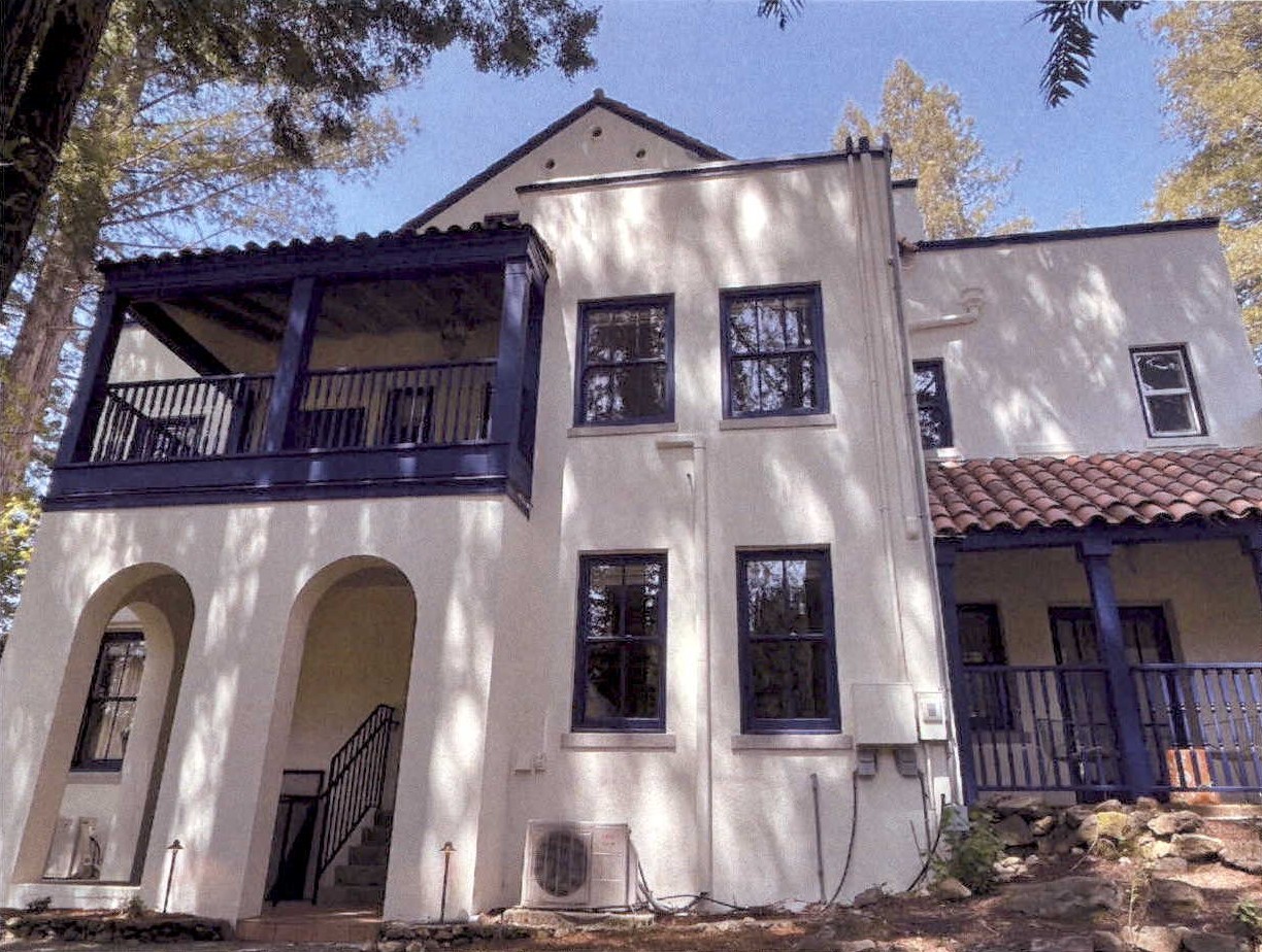 West half of south facade, view of raised entry stairs